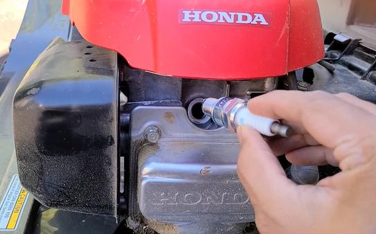 Honda lawn mower spark plug hotsell