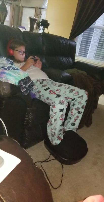 My 9 year old using the massager after soccer