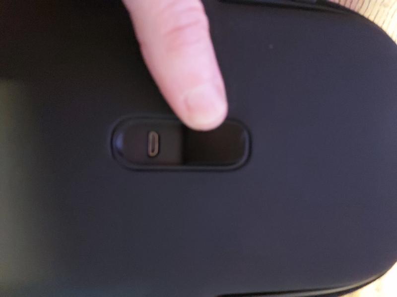 USB port under flap next to power icon