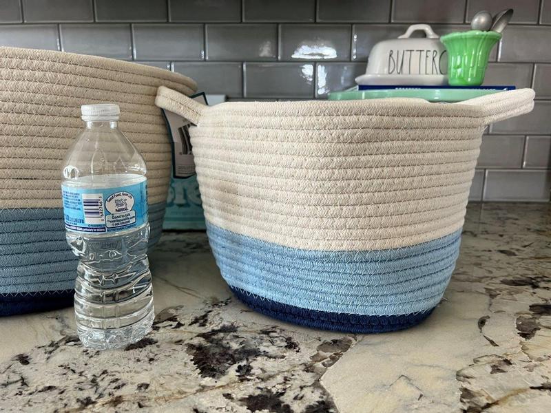 bottle next to small basket