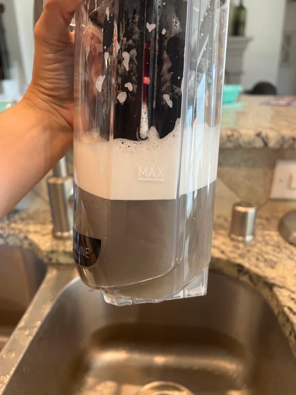 First pass over the kitchen tile floors. So gross, but thankful that it was able to clean all this off the tile!