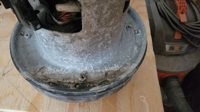 NEVER vacuum water into an upright!