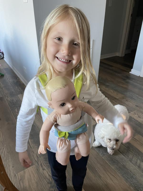 My daughter using her new baby carrier