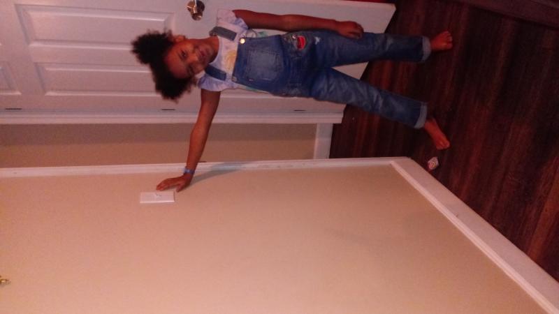 Rocking her overalls