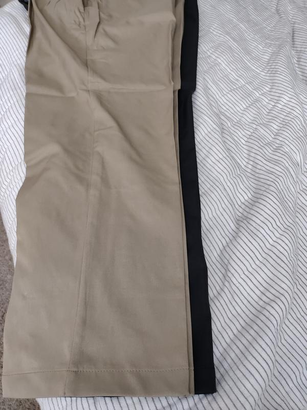 Dark slacks are 30s tan are 29s. Both Haggar.