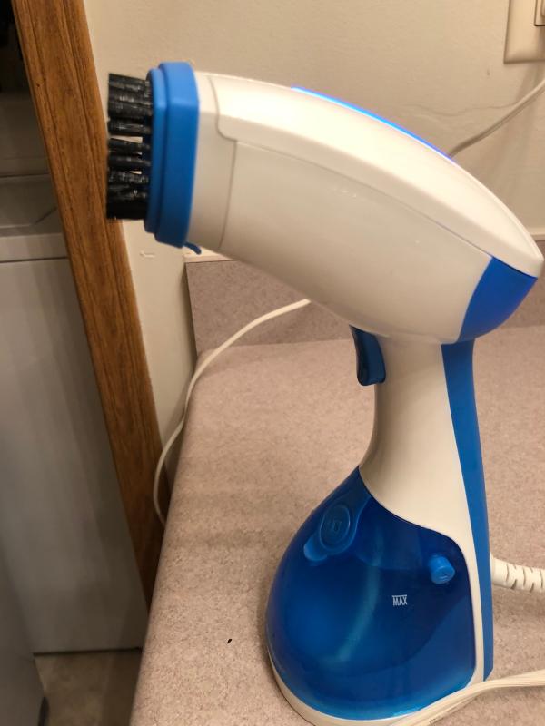 Hand held steamer