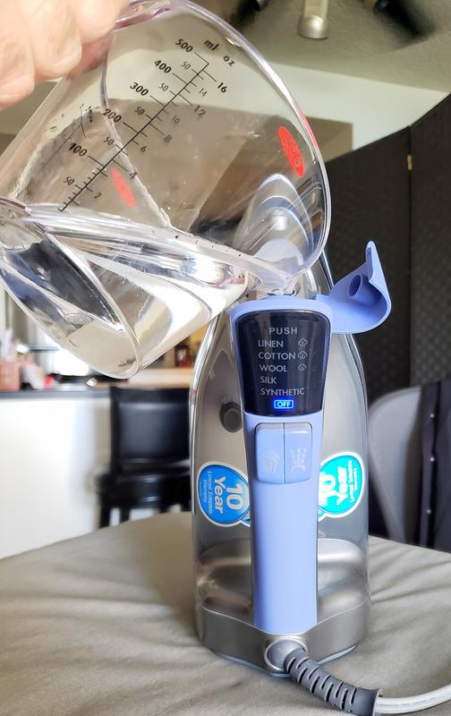 Using Distilled Water - Pouring it into large water chamber