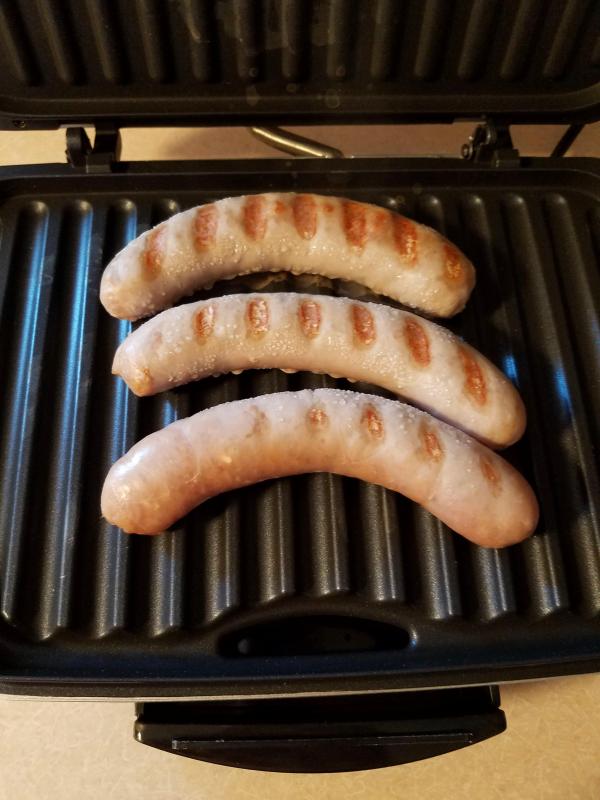 Raw sausages, didn’t finish on the grill, I gave up on them and finished on the stove