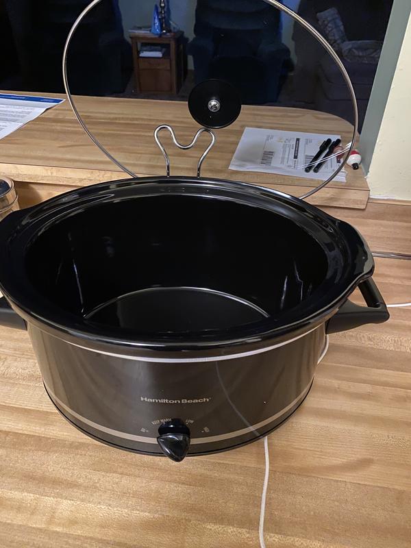 Hamilton Beach This Hamilton Beach 8 Quart Slow Cooker has a mess-free lid  rest and extra-large capacity. It's perfect for game-day chili or serving a  large family. It holds a 6 lb