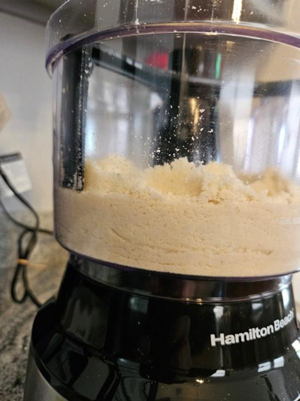 Scraper arm doesn't come close to the bottom of the bowl.