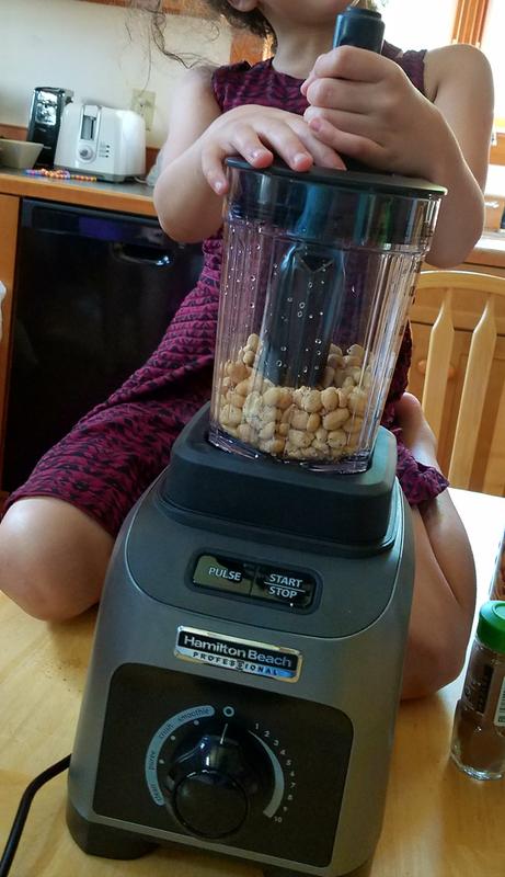 Grandchild helping with the peanut butter using our new Hamilton Beach Blender