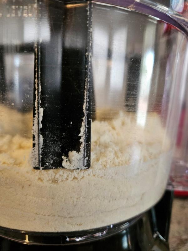 Scraper arm doesn't clean the bowl at the bottom.