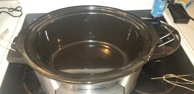 The crock is now clean.  It came out of the box with styrofoam residue.  A quick wash and it's ready to go.