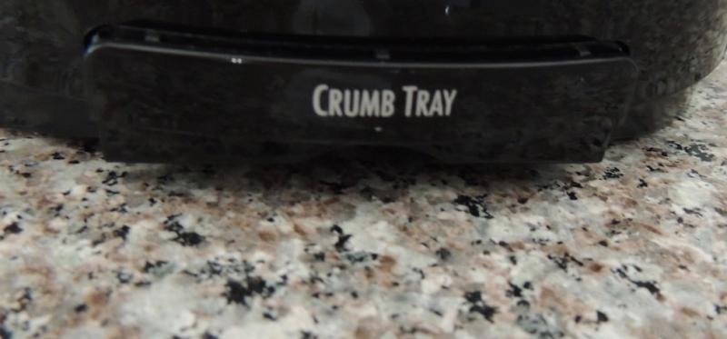 Easy to pull out and clean, Crumb Tray!  Located at the back of the toaster.