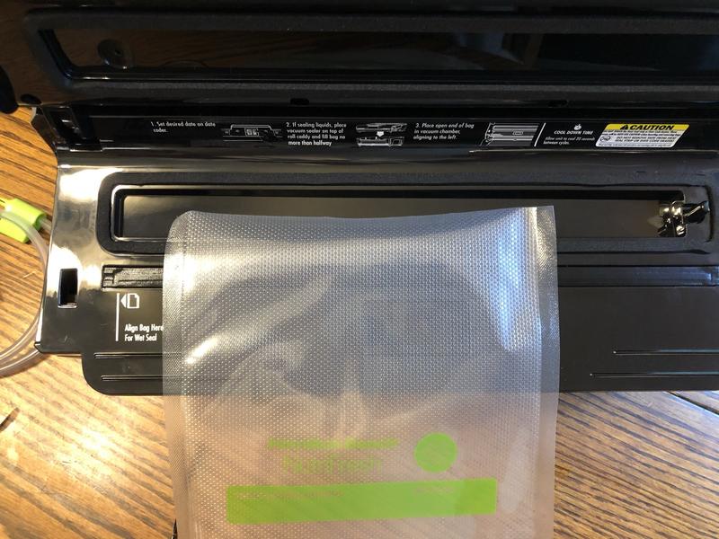 This is where you should align the top of the bag to get a good vacuum seal.