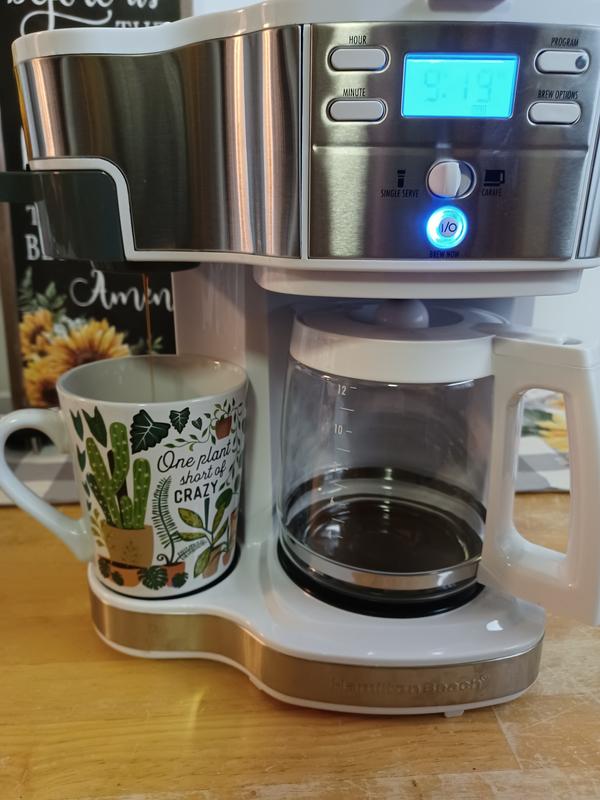 Coffee being brewed from single serve side