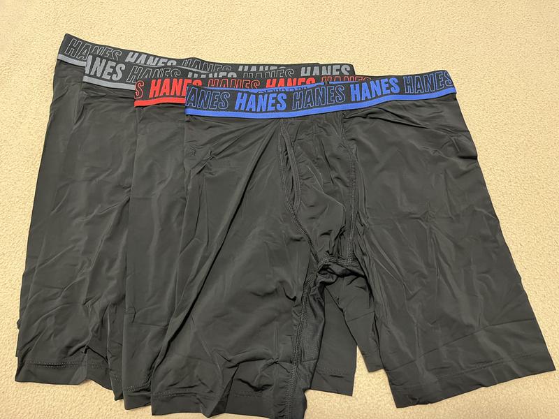 Four pack of 8" long leg black boxer briefs with colored waistbands.