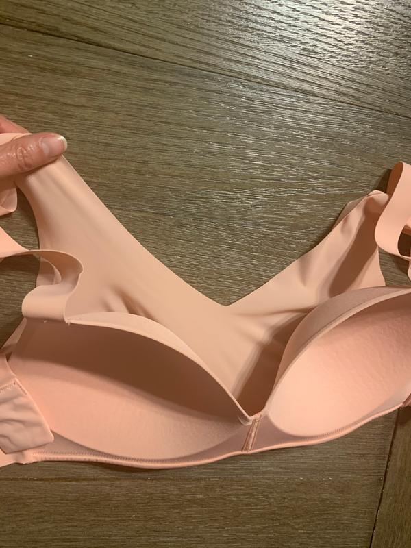 Molded inner layer and thin outer layer for a seamless look under clothing