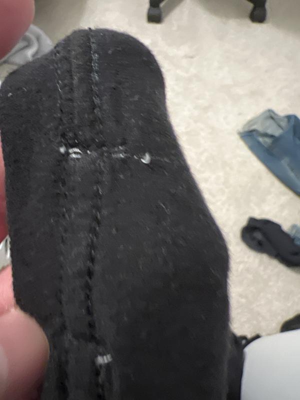 Why white stitching on a black shirt?