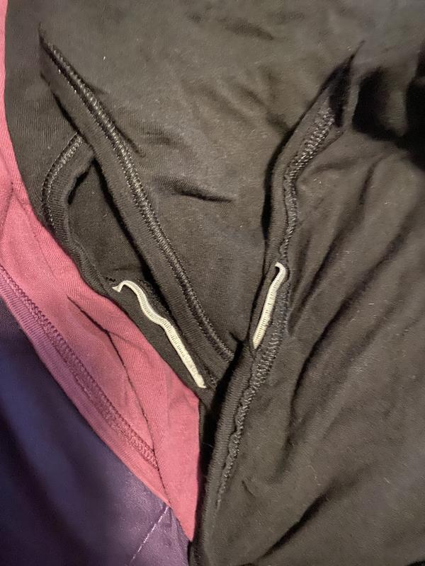 Black is most recent purchase. The seams are coming apart after a couple wears/washes. The white part inside rubs funny. The purple ish pair under is and older pair that has held up super wear after many many wears and washes.