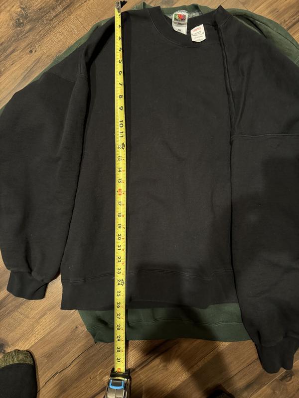 Fruit of the Loom 2XL green sweatshirt on bottom, Hanes black sweatshirt on top.  You can see how short Hanes is by comparison.  Neither of these is a Tall size.