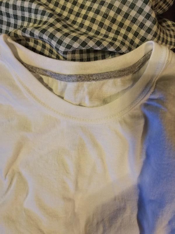 Good neckline, even but the shirt does shrink about one size for me