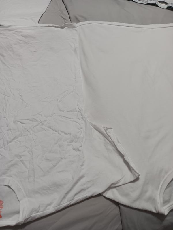 Wrinkled, shrunken, and smaller than the previous XL we have purchased before.