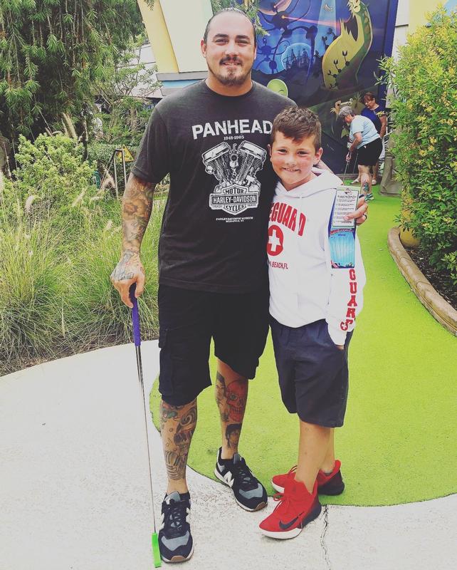 Putt putt with my son at Universal