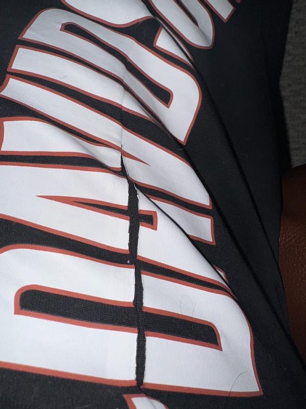 Immediate split of decal on right leg
