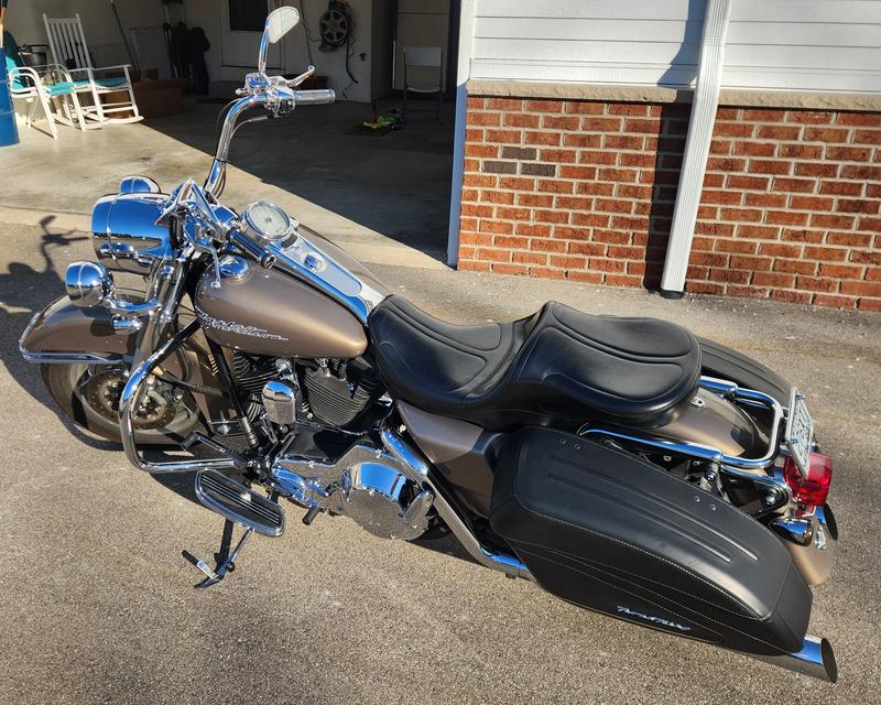 2004 RK Custom with new HD Heritage style bars and HD slotted mirrors