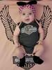 She's a Harley girl in a Harley world.