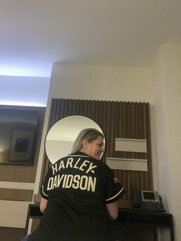 It is a perfect fit. Custom for a female. Not boxy/baggy. I love that it’s lightweight goes with anything. Have also received so many complements. So glad I purchased this Harley Davidson Jersey! I love HD but must say this is my favorite purchase EVER!!