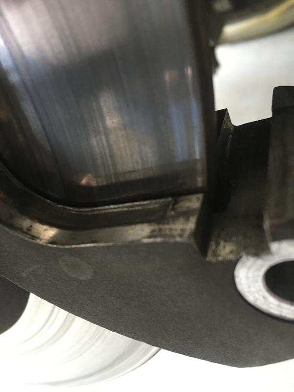 2014 Tri Glide rear brake pad bracket wear.