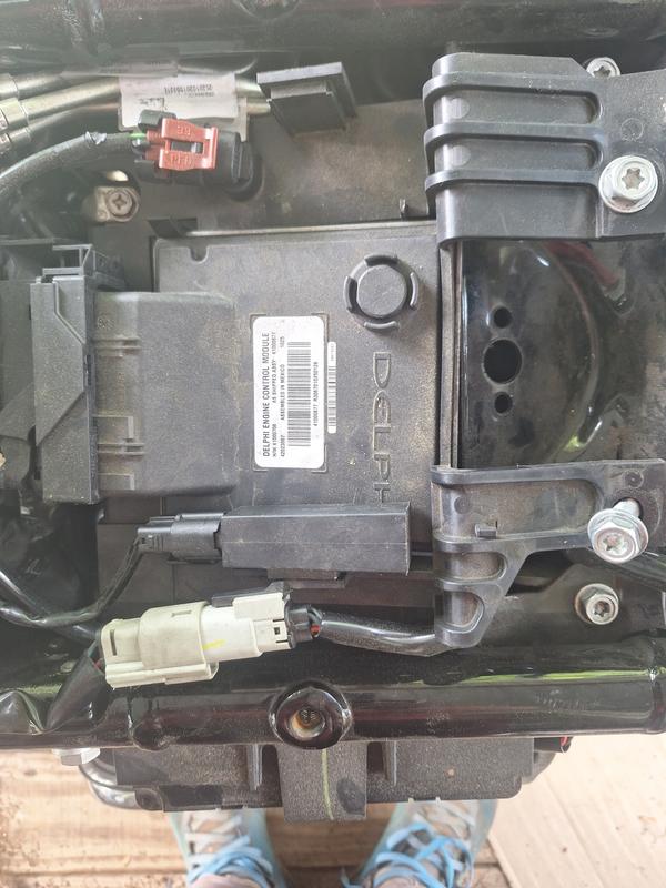 What is on top of the battery.  ECM.