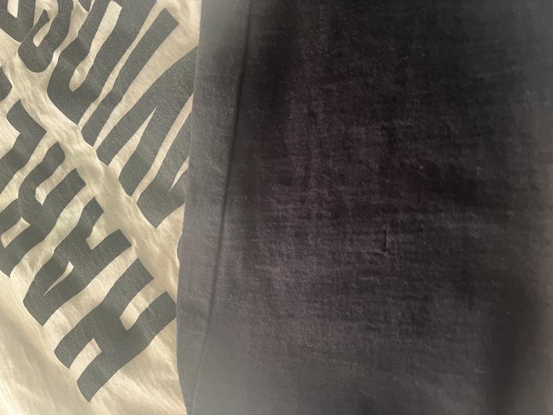 Pictures of the tear in the sleeve.