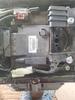 What is on top of the battery.  ECM.