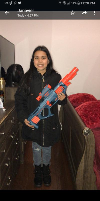 My daughter holding her new nerf gun elite 2.0