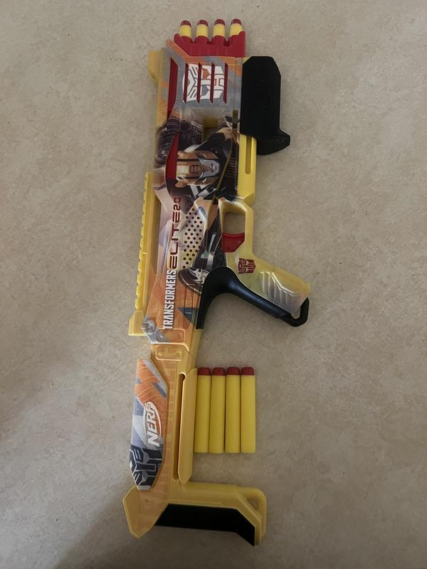 Nerf gun loaded with 4 darts and 4 darts out
