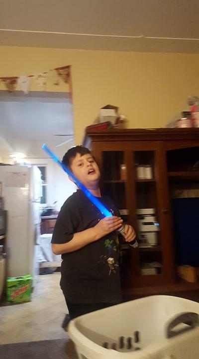 My son and his lightsaber