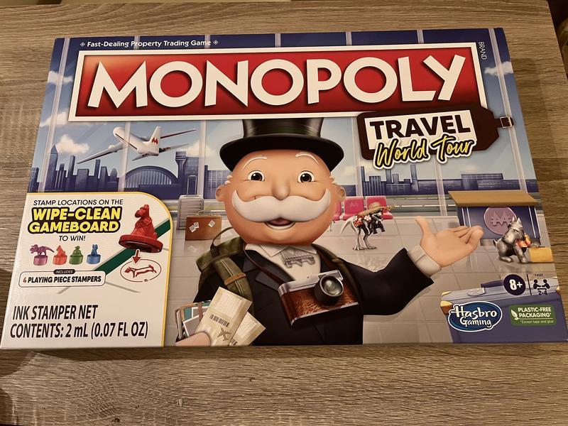 Monopoly Travel World Tour Board Game for Families and Kids Ages 8+,  Includes Token Stampers and Dry-Erase Gameboard - Monopoly