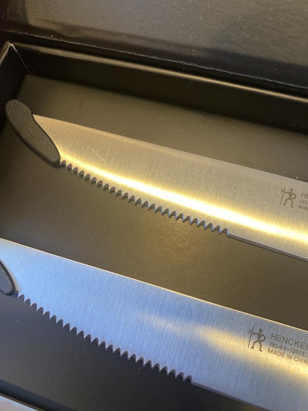 A couple of knives have scratches like the top one pictured