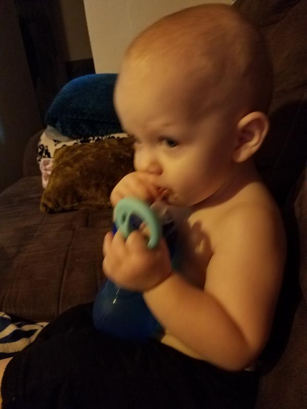 18 month old eating a piece of the chocolate.