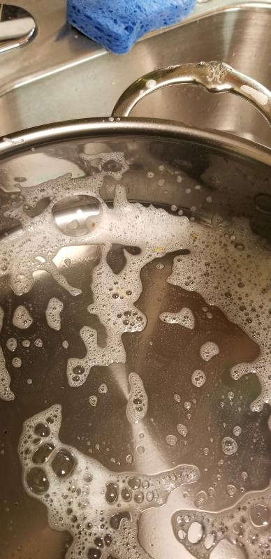 All baked on oil stains and food grim cleans right off easily with light scrubbing, and to bring each item back to it's original luster one must also purchase a bottle of their polishing liquid as this will have it looking brand new within minutes.