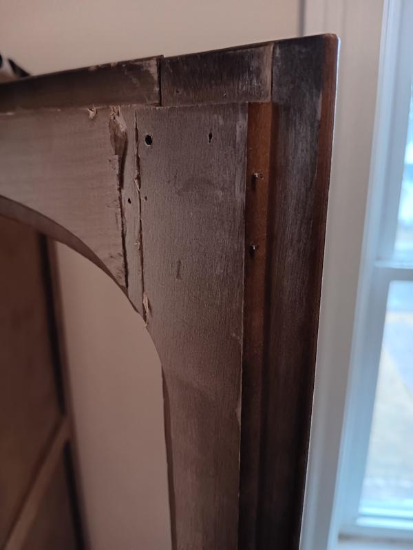 Restoring an antique wardrobe door -- 2" nails almost flush