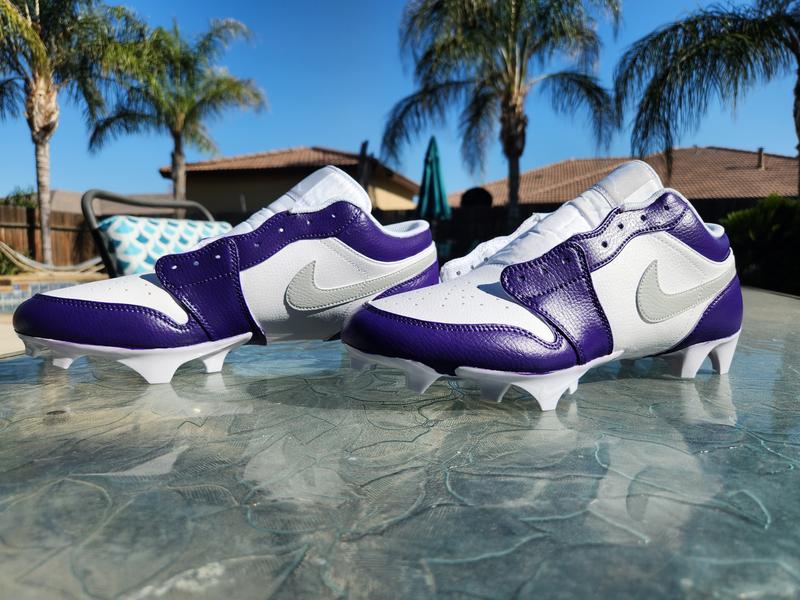 Purple jordan football store cleats