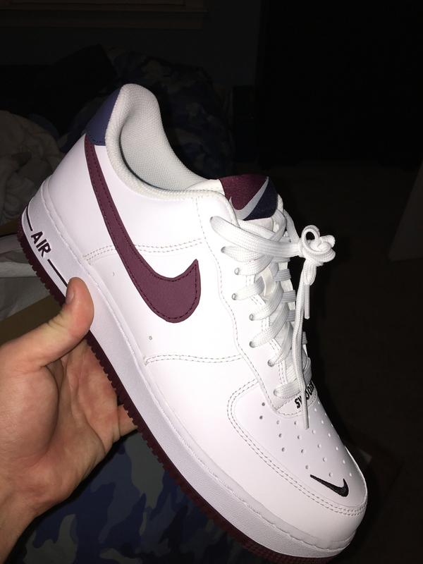 white and burgundy air force ones