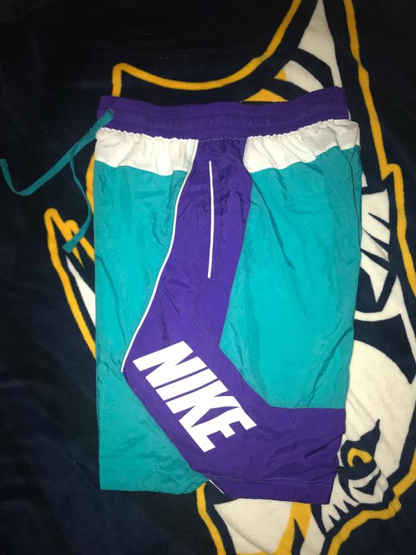 purple and turquoise nike shorts