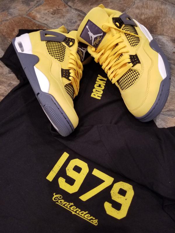 blue and yellow jordan 4