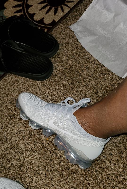 all white vapormax on feet