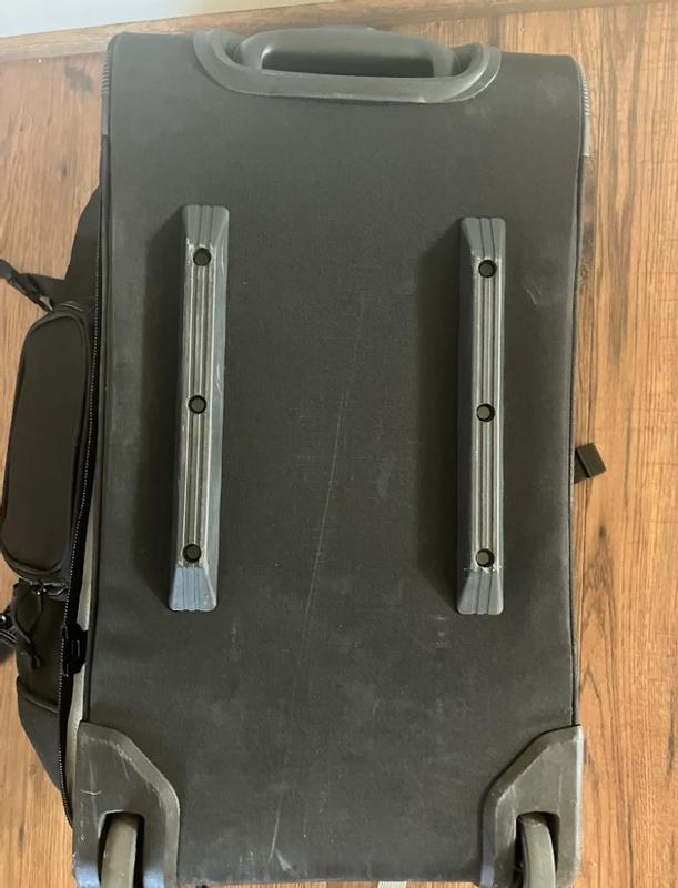 Bottom rails on back make sliding into  overhead airline compartments more difficult